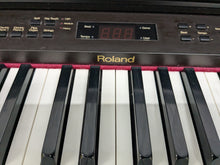 Load image into Gallery viewer, Roland HP330 digital piano in rosewood stock #25046