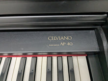 Load image into Gallery viewer, Casio Celviano AP-40 digital piano in satin black finish stock #25060
