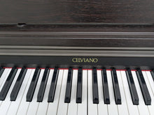 Load image into Gallery viewer, CASIO CELVIANO AP-200 DIGITAL PIANO AND STOOL IN DARK ROSEWOOD stock #25065
