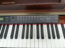 Load image into Gallery viewer, Yamaha Clavinova CLP-150 digital piano and stool in mahogany stock #25064