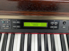 Load image into Gallery viewer, Yamaha Clavinova CLP-150 digital piano and stool in mahogany stock #25064