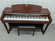 Load image into Gallery viewer, Yamaha Clavinova CLP-150 digital piano and stool in mahogany stock #25057