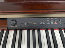 Load image into Gallery viewer, Yamaha Clavinova CLP-150 digital piano and stool in mahogany stock #25057