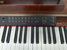 Load image into Gallery viewer, Yamaha Clavinova CLP-150 digital piano and stool in mahogany stock #25057