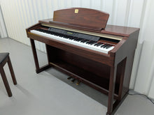 Load image into Gallery viewer, Yamaha Clavinova CLP-150 digital piano and stool in mahogany stock #25057