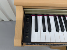 Load image into Gallery viewer, Roland HP201 digital piano and stool in light oak finish stock number 25085