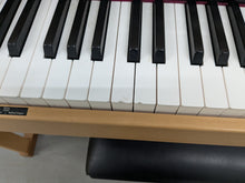 Load image into Gallery viewer, Roland HP201 digital piano and stool in light oak finish stock number 25085
