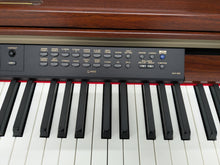 Load image into Gallery viewer, YAMAHA CLAVINOVA CLP-270 DIGITAL PIANO AND STOOL IN MAHOGANY FINISH stock #25090