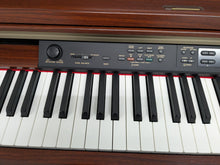 Load image into Gallery viewer, YAMAHA CLAVINOVA CLP-270 DIGITAL PIANO AND STOOL IN MAHOGANY FINISH stock #25090