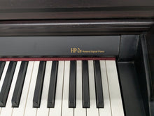 Load image into Gallery viewer, Roland HP-2e digital piano and stool in dark rosewood finish stock number 25097