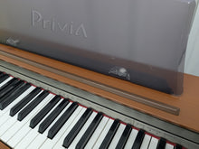 Load image into Gallery viewer, Casio Privia PX-730 Compact slimline Digital Piano Full size . Stock no 25109