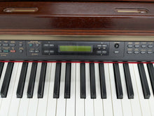 Load image into Gallery viewer, Yamaha Clavinova CLP-170 Digital Piano in mahogany colour stock #25108