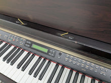 Load image into Gallery viewer, Yamaha Clavinova CLP-150 digital piano and stool in dark rosewood stock #25116