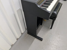 Load image into Gallery viewer, Roland RP301 digital piano in satin black finish stock number 25156
