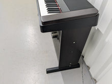 Load image into Gallery viewer, Yamaha DGX-650 in black 88 Weighted Keys Portable Grand 3 pedals stock #25165