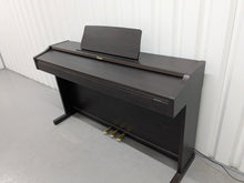 Load image into Gallery viewer, Roland RP101 Digital Piano in dark rosewood Stock # 2590