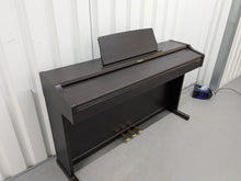 Load image into Gallery viewer, Roland RP101 Digital Piano in dark rosewood Stock # 2590