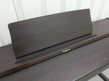 Load image into Gallery viewer, Roland RP101 Digital Piano in dark rosewood Stock # 2590