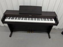 Load image into Gallery viewer, Roland RP101 Digital Piano in dark rosewood Stock # 2590