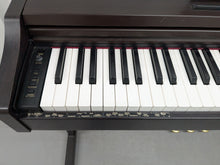 Load image into Gallery viewer, Roland RP101 Digital Piano in dark rosewood Stock # 2590