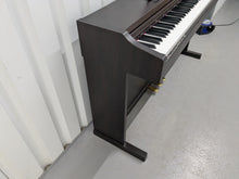 Load image into Gallery viewer, Roland RP101 Digital Piano in dark rosewood Stock # 2590