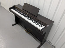 Load image into Gallery viewer, Roland RP101 Digital Piano in dark rosewood Stock # 2590