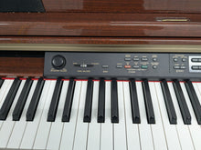 Load image into Gallery viewer, Yamaha Clavinova CLP-280 in Polished Mahogany with matching stool stock nr 25188