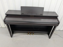 Load image into Gallery viewer, Yamaha clavinova CLP-825 digital piano and stool in dark rosewood stock #25198