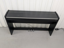 Load image into Gallery viewer, Roland F130R compact slim size Digital Piano in black stock # 25187