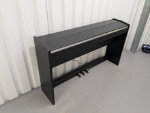 Load image into Gallery viewer, Roland F130R compact slim size Digital Piano in black stock # 25187