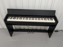 Load image into Gallery viewer, Roland F130R compact slim size Digital Piano in black stock # 25187
