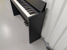 Load image into Gallery viewer, Roland F130R compact slim size Digital Piano in black stock # 25187