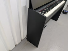 Load image into Gallery viewer, Roland F130R compact slim size Digital Piano in black stock # 25187
