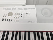 Load image into Gallery viewer, Yamaha DGX-650 in white 88 Weighted Keys Portable Grand 3 pedals stock #25201