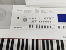Load image into Gallery viewer, Yamaha DGX-650 in white 88 Weighted Keys Portable Grand 3 pedals stock #25201