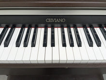 Load image into Gallery viewer, CASIO CELVIANO AP-220 DIGITAL PIANO AND STOOL IN DARK ROSEWOOD stock #25210