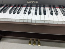 Load image into Gallery viewer, CASIO CELVIANO AP-220 DIGITAL PIANO AND STOOL IN DARK ROSEWOOD stock #25210