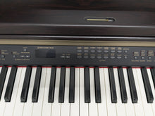 Load image into Gallery viewer, Yamaha Clavinova CLP-240 Digital Piano in dark rosewood stock nr 25247