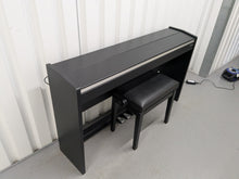 Load image into Gallery viewer, Roland F140R Digital Piano in satin black slim line space saver stock # 25253