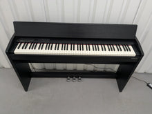Load image into Gallery viewer, Roland F140R Digital Piano in satin black slim line space saver stock # 25253