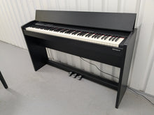 Load image into Gallery viewer, Roland F140R Digital Piano in satin black slim line space saver stock # 25253