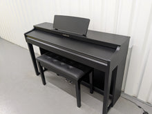 Load image into Gallery viewer, Yamaha clavinova CLP-525 digital piano in satin black colour stock # 25297