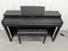 Load image into Gallery viewer, Yamaha clavinova CLP-525 digital piano in satin black colour stock # 25297