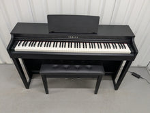 Load image into Gallery viewer, Yamaha clavinova CLP-525 digital piano in satin black colour stock # 25297