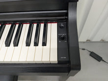 Load image into Gallery viewer, Yamaha clavinova CLP-525 digital piano in satin black colour stock # 25297