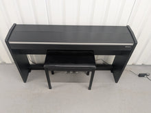 Load image into Gallery viewer, Roland F140R Digital Piano in satin black slim line space saver stock # 25303