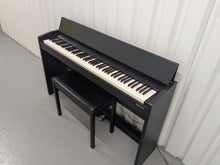 Load image into Gallery viewer, Roland F140R Digital Piano in satin black slim line space saver stock # 25303