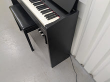 Load image into Gallery viewer, Roland F140R Digital Piano in satin black slim line space saver stock # 25303