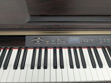 Load image into Gallery viewer, Yamaha Clavinova CLP-120 Digital Piano in dark rosewood stock #25305