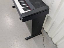 Load image into Gallery viewer, Yamaha DGX-660 black portable grand piano keyboard and stand stock #25314